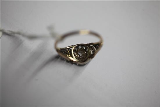 A Georgian gold, silver and diamond set cluster ring, size M/N.